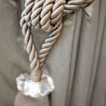 rope tied to a curtain rod