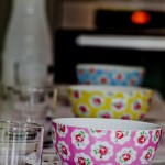 colorful bowls and glasses on a table