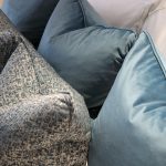 group of pillows on a couch